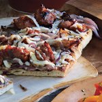 Grilled Flatbreads with Caramelized Onions, Sausage, and Manchego Cheese