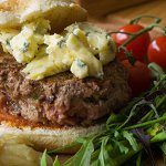 Inverted Cashel Blue Cheeseburger with Roasted Tomatoes and Red Onion Salad