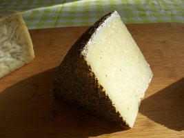 Manchego with rosemary-coated rind